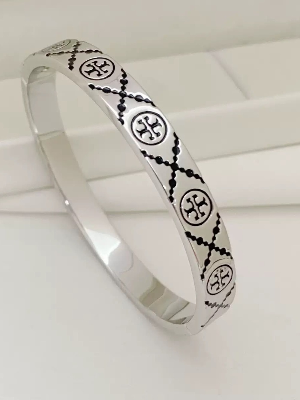 Tory Burch Silver and Black Line Monogram Logo Bangle Bracelet